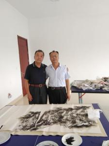 李广畅与著名书画家鲁振岳在一起